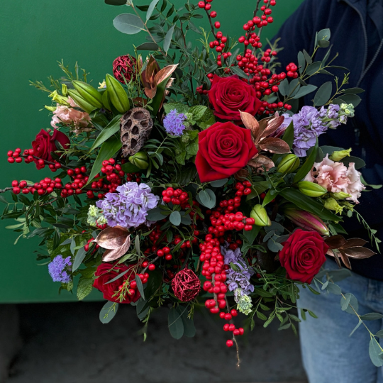 Christmas bouquet with berries and Roses 